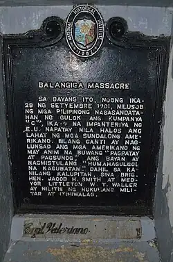 Historical marker at the foot of Abanador statue[d]