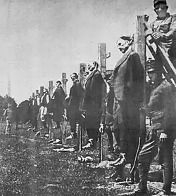 Austro-Hungarian soldiers executing Serb civilians during World War I.