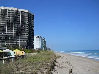 Looking north along the beach from Shuckers Restaurant, 9800 South Ocean Drive
