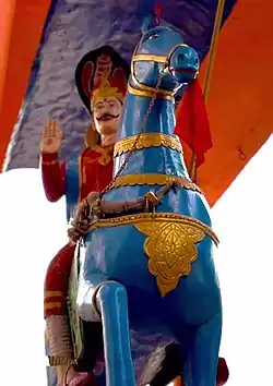Idol of Gogaji Maharaj on a blue horse at Gogamedi Temple.