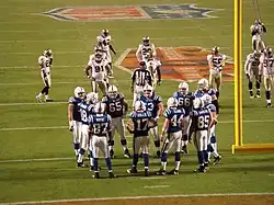 The Colts huddling