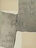 Part of a gravestone. The photo dates from 1919.