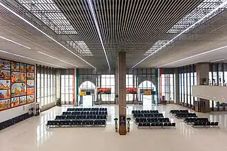 Interior of the airport, with two departure gates leading to the apron