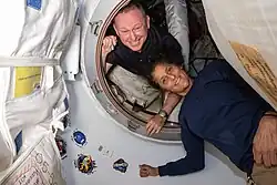 Williams and Wilmore in the vestibule that connects the ISS to Starliner