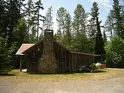 East elevation with stone chimney (2009)