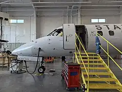 JSX ERJ-145 undergoing maintenance at Crucial MRO