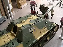 Jagdpanther equipped with the Nahverteidigungswaffe on the upper left side of the roof. Center left side of the roof.