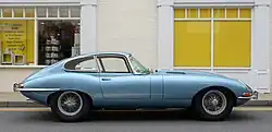 Front-engine, rear-wheel drive coupe: 1964 Jaguar E-Type. Automotive designers call the position of the driver's hip close to the rear axle "close-coupled".[22]