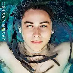 The cover features a close-up photo of Jason Castro lying down on the water. The artist's name is placed vertically on the left side, with both O's having a yellow and teal background respectively.