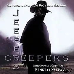 A shadowy figure stands in the center of the album cover for "Jeepers Creepers".