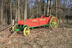 A horse-drawn manure spreader