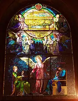 The Angel of Help, John La Farge, North Easton, MA, shows the use of tiny panes contrasting with large areas of opalescent glass. Window restored by Victor Rothman Stained Glass, Yonkers NY.