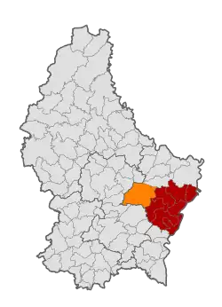 Map of Luxembourg with Junglinster highlighted in orange, and the canton in dark red