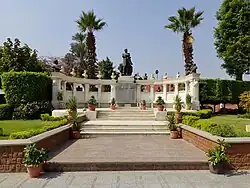 Monument to Auguste Mariette surrounded by bust sculptures in the museum garden