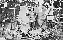Japanese vigilantes with murdered victims in the aftermath of the Kanto earthquake.
