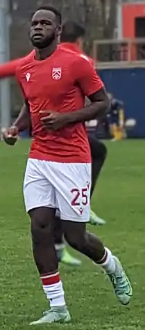 Soccer player jogging during warm-up