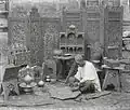 A woodcarver in Kashmir photographed by Fred Bremner in about 1896.