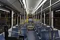 Catalyst interior, looking back from forward aisle. Like other partial low-floor buses, there is a step at the rear axle for mechanical clearance.