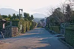 Small street lined by walls.