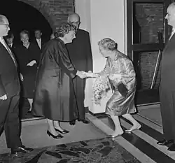 A Dutch woman curtsying to Queen Juliana of the Netherlands, 1964.