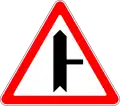 Junction with minor road (from the right) (also used )