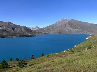 A lake surrounded by a mountainous landscape.