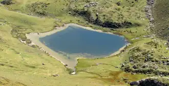 A lake surrounded by land.