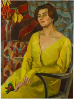 Painting of a woman with short brown hair sitting in a chair and wearing a long-sleeved yellow dress.