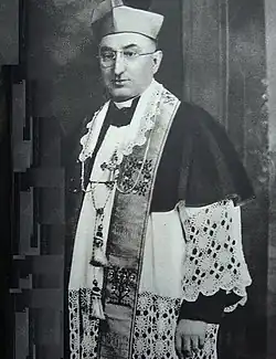 A portrait of Bishop Hodur, wearing a Biretta, taken in 1923.