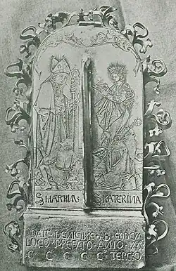 Rear of the German 15th-century Eberbach Pax, with handle and engraved saints