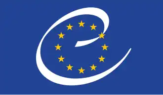 Logo of the Council of Europe , — twelve golden stars in a circle ,