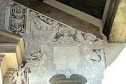 Buti's sgraffito above the entrance