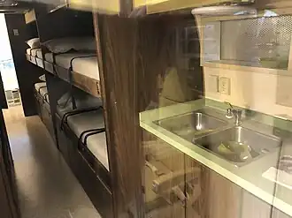 MQF002 Apollo mobile quarantine facility sink and 6 bunk area.