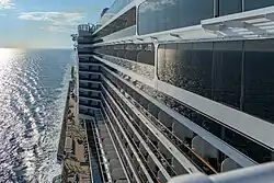 View of starboard side balconies and promenade deck below