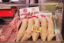 piglet carcases displayed for sale