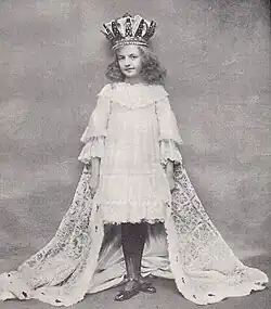 Young girl in stage costume as a queen