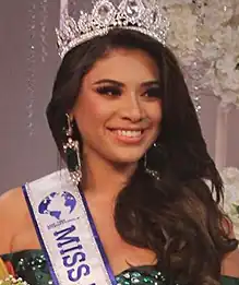 Maria Alejandra Royo wears a sash and crown after becoming Miss Teen International 2020