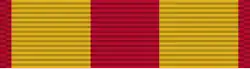 Red ribbon with two broad dark yellow stripes