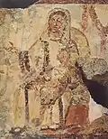300-350 A.D. Mary and Jesus in scene of adoration by the Magi, Domitilla Catacomb.