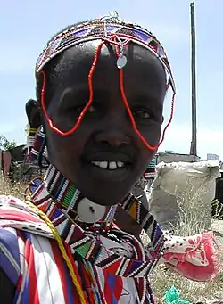 Image 2Maasai woman in traditional headdress and attire. (from Culture of Kenya)