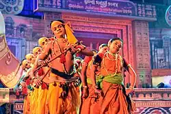 Artistes performing Mayurbhanj Chau with depiction of Krishna and gopi