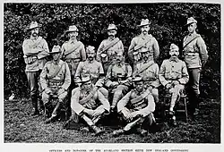 Formative shot of a group of army personnel in late colonial-era army uniforms.