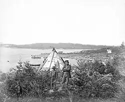 A Mi'kmaq father and child at Tufts Cove, Nova Scotia, around 1871