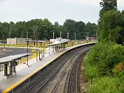 A curved high-level railway station platform