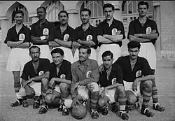 Allawi with the Al-Minaa lineup in 1950 at Al-Amjadiya Stadium in Tahran, with the seated players, second from the left.