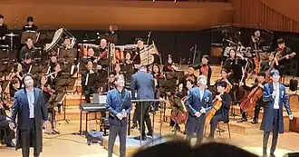 Miraclass curtain call at the 'Korean Film Music Concert with Miraclass' and WE Philharmonic Orchestra in 2023