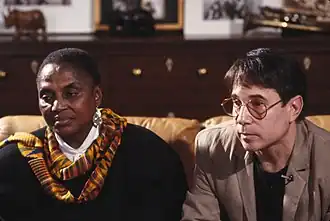 South African activist and singer, Miriam Makeba and American singer- songwriter Paul Simon.