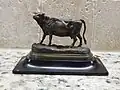 Miniature cabinet bronze of a dairy cow on a slate plinth