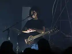 Motta playing live in Pisa in 2017