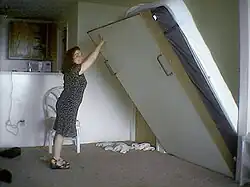 Folding a pull-down bed